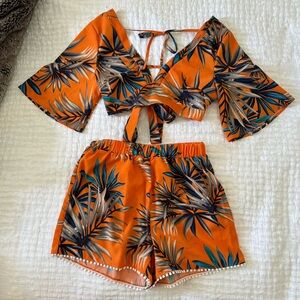 Matching top and bottom orange jungle outfit